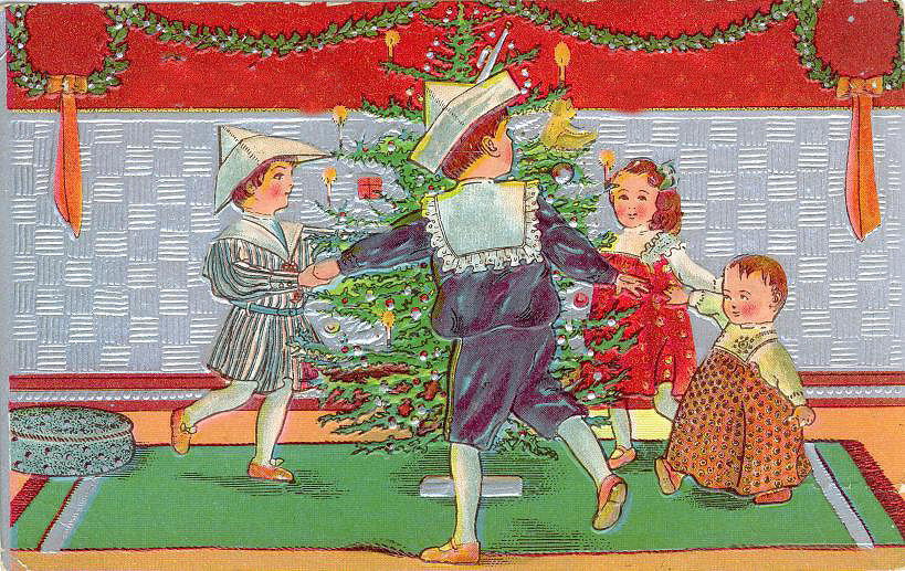 Edwardian Christmas Card: Children Dancing Around Tree with Elegantly Dressed Figure