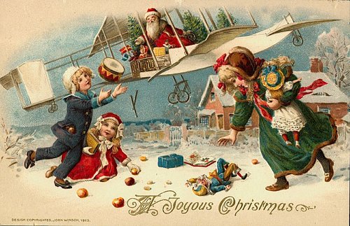 Vintage 1913 Flying Santa Christmas Card with Children